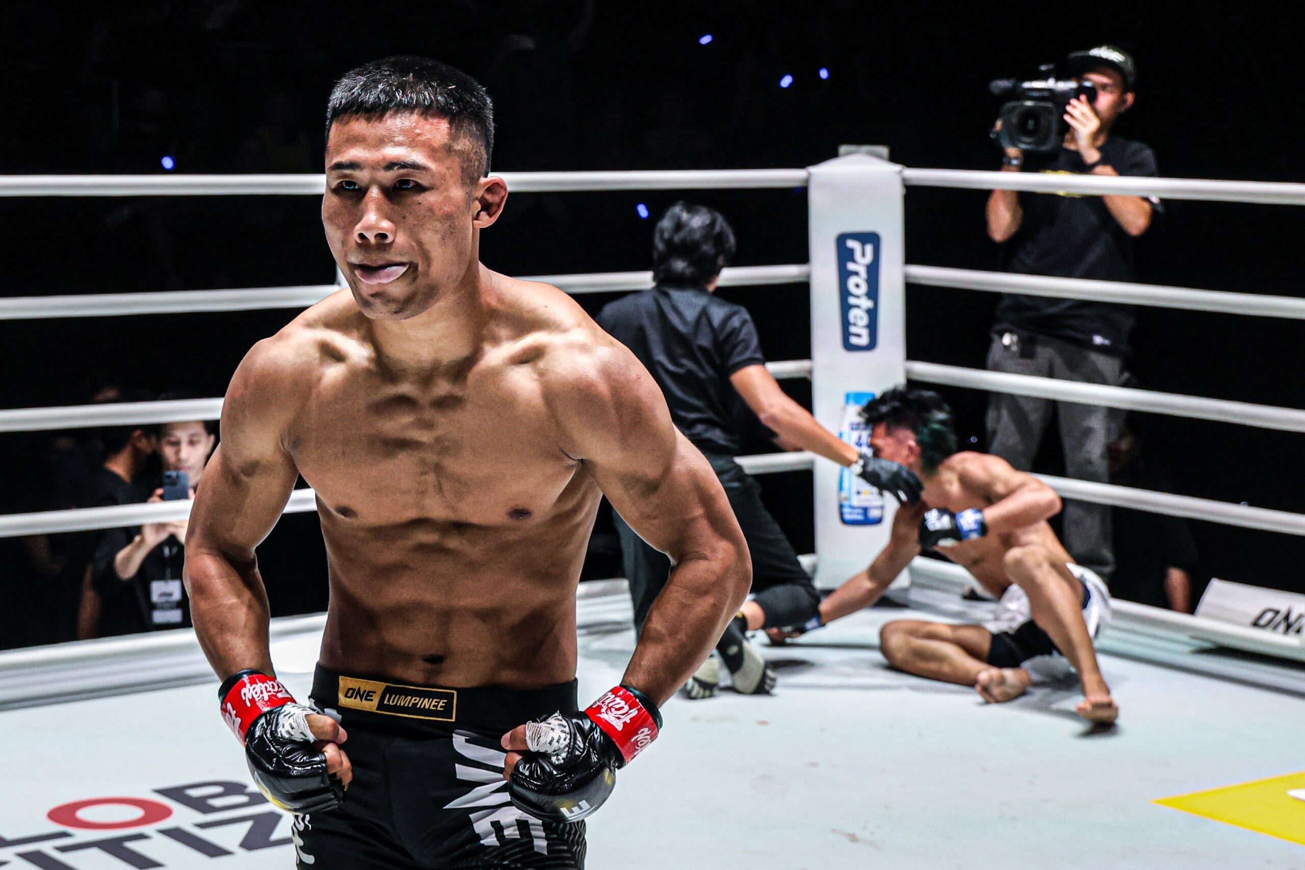 Nazareth Lalthazuala celebrates after knocking out Jhon Brutas