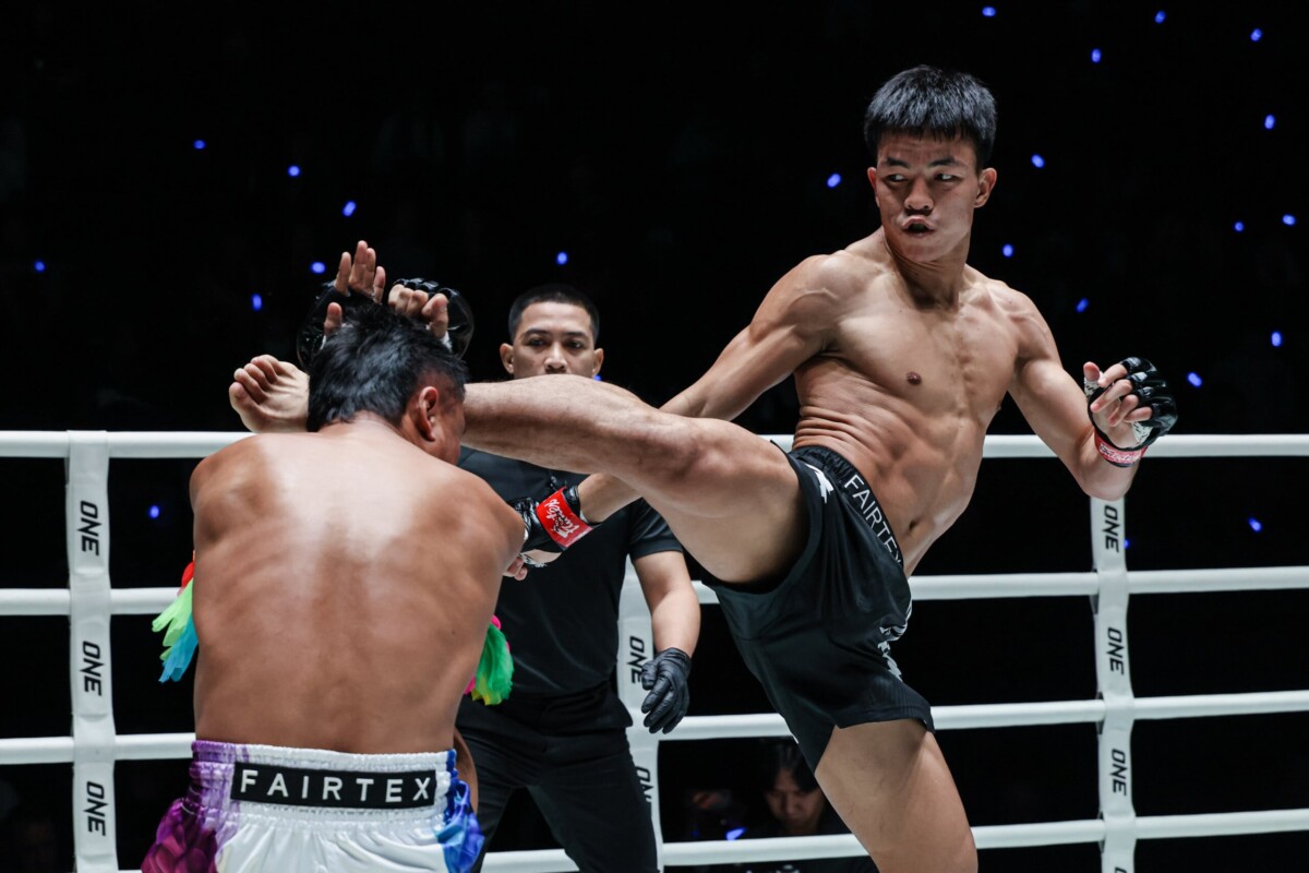 Dedduanglek Torfunfarm goes high with a kick against Mongkoldetlek Por Pim at ONE Friday Fights 174.