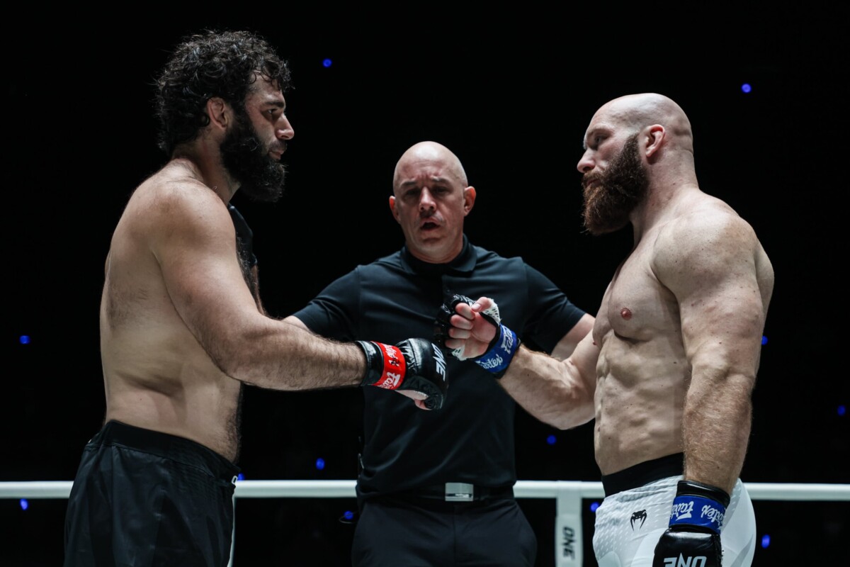 Shamil Erdogan and Paul Elliott touch gloves before their fight at ONE Fight Night 48