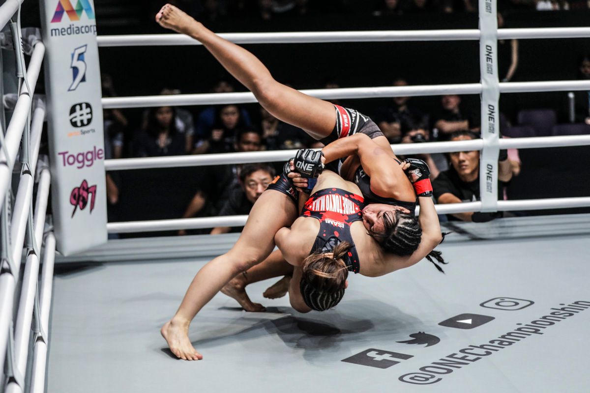 Japanese mixed martial artist Ayaka Miura throws Laura Balin