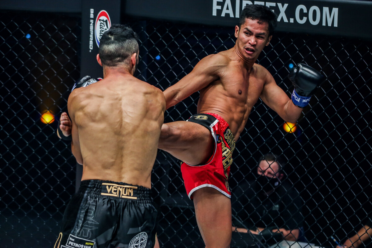 Superbon throws a hard kick to the body of Giorgio Petrosyan at ONE: FIRST STRIKE.