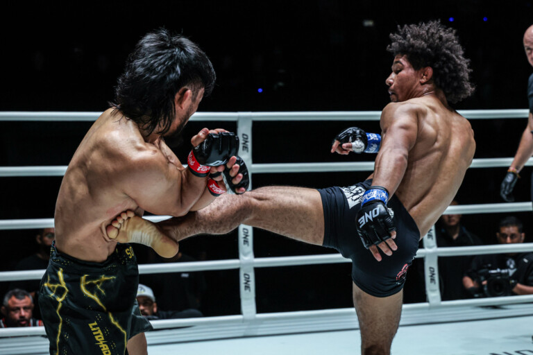 Brazilian MMA fighter Antonio Cesar kicks Lito Adiwang